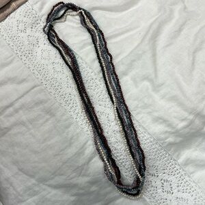 Five beaded strand necklaces